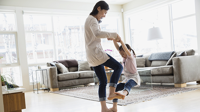 Mother playing with daughter