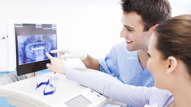 Two doctors checking an X-ray